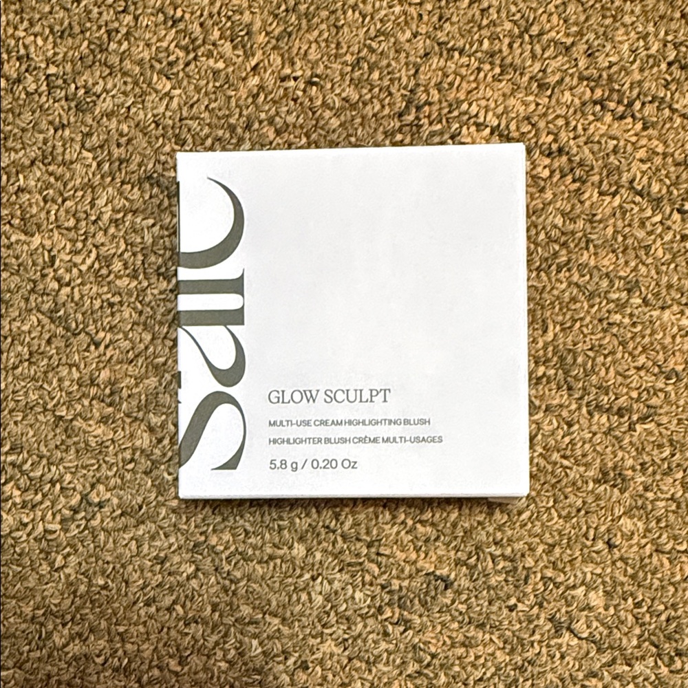 Saie Glow Sculpt Multi-Use Cream in White Packaging